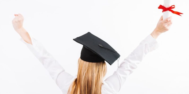 [freepicdownloader.com]-proud-woman-posing-with-certificate-education-normal
